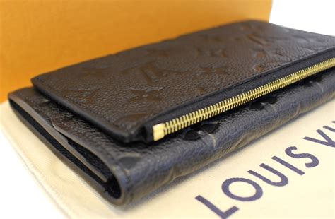 louis vuitton black embossed wallet|louis vuitton black monogram wallet.